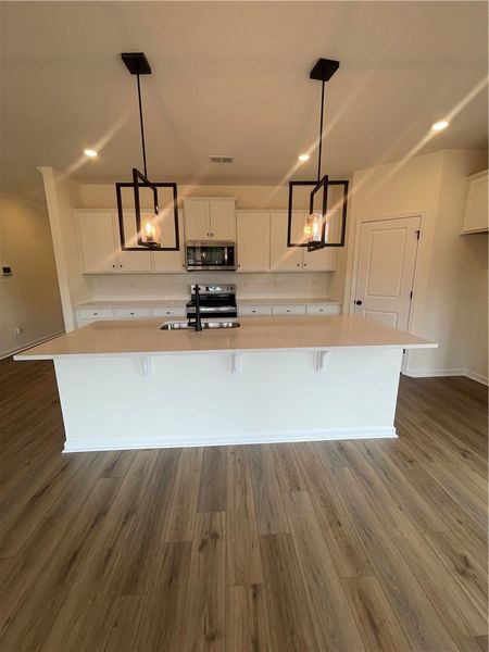 Furnished interior view inside a new home in Springwood Grove, Central (Image 7).