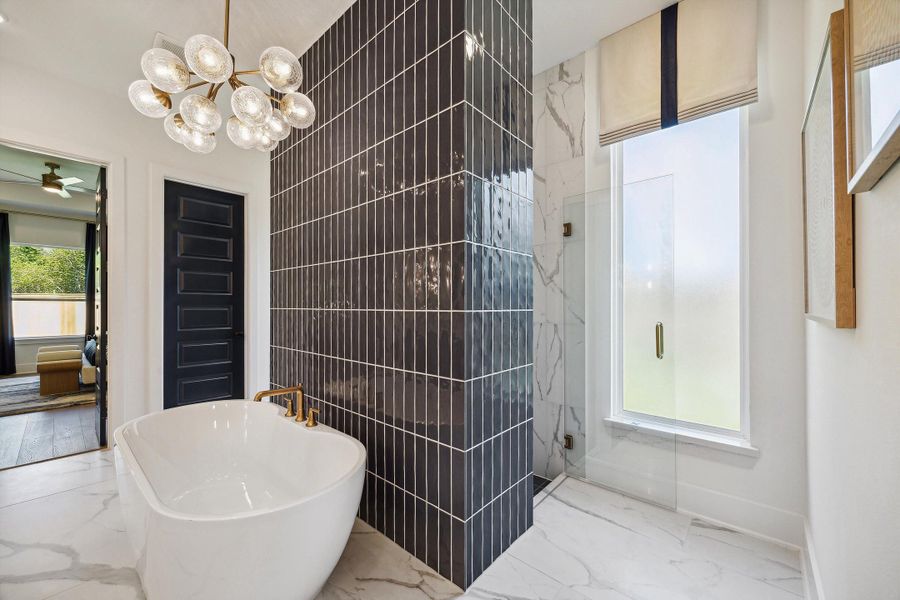 Representative furnished interior of a home built from the The Jaxson IX by Westin Homes in The Woodlands Hills, Willis (Image 19).