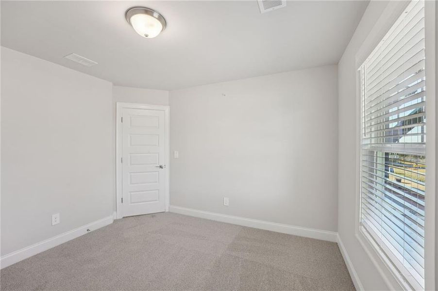 Spacious, unfurnished interior of a new home in Hemingway - Highland Series, Cumming (Image 25).