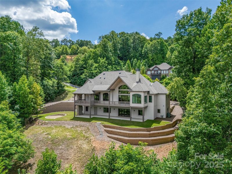 Front exterior of a new home in , Zirconia, NC, highlighting curb appeal (Image 25). Front exterior of a new home in , Zirconia, NC, highlighting curb appeal (Image 25).