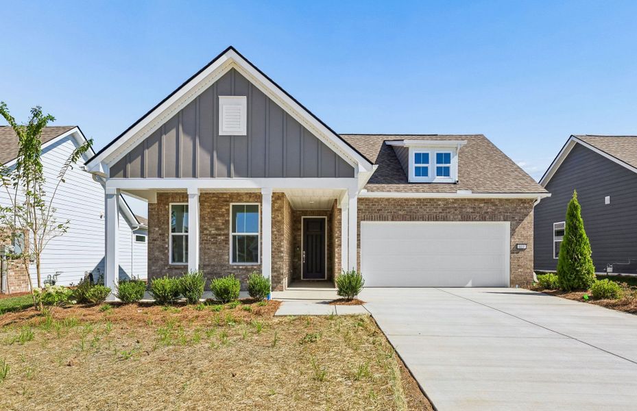 Front exterior of a new home in Del Webb Southern Harmony, Murfreesboro, TN, highlighting curb appeal (Image 20).