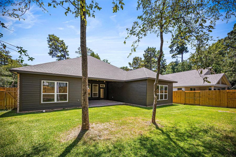 Front exterior of a new home in , Montgomery, TX, highlighting curb appeal (Image 18).