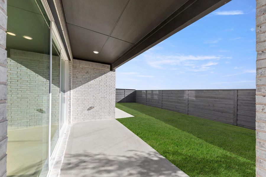 Exterior details and patio area of a home in Garden Collection at Union Park, Little Elm (Image 4). Exterior details and patio area of a home in Garden Collection at Union Park, Little Elm (Image 4).