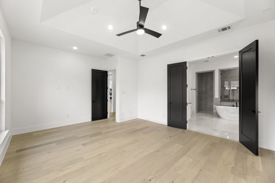 Representative unfurnished interior of a home built from the 6051 by Tradition Homes in Mustang Lakes, McKinney (Image 23).