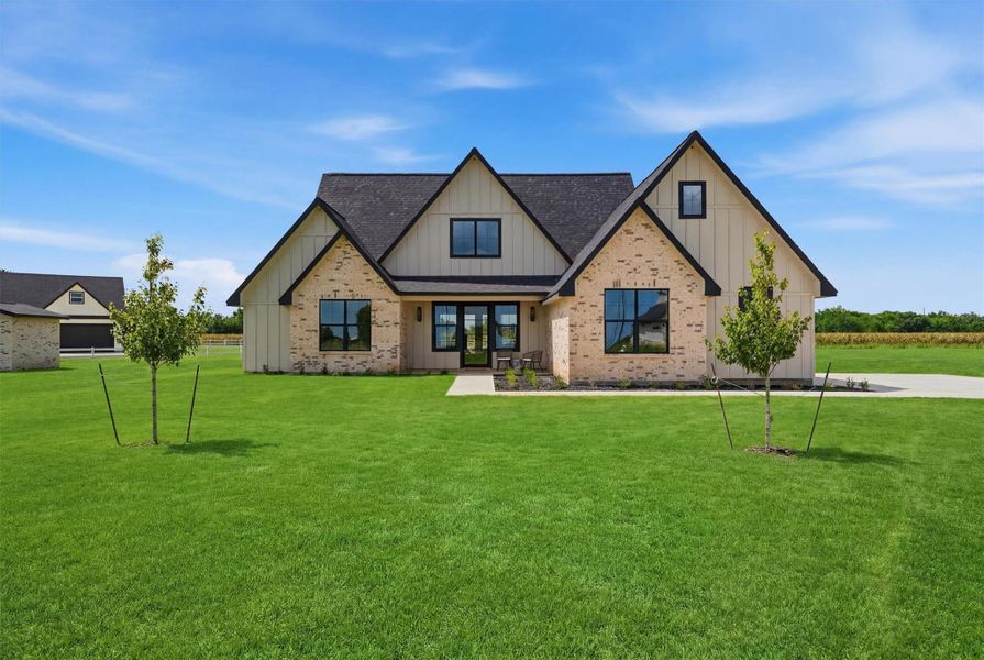Front exterior of a new home in , Sealy, TX, highlighting curb appeal (Image 26). Front exterior of a new home in , Sealy, TX, highlighting curb appeal (Image 26).