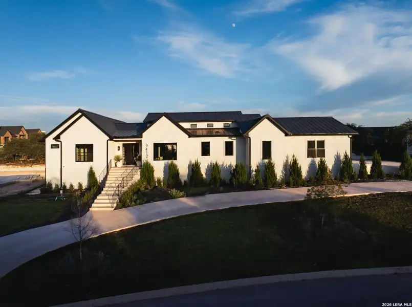 Front exterior of a new home in , San Antonio, TX, highlighting curb appeal (Image 34).