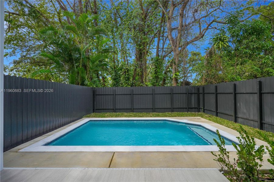 Exterior details and patio area of a home in , Miami (Image 24).