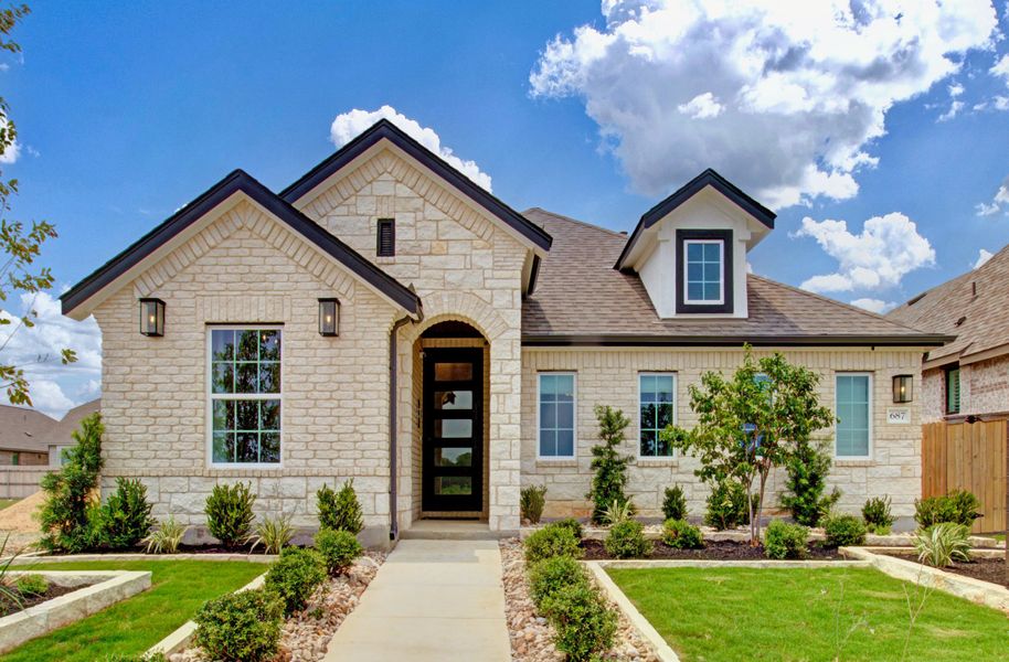 Representative exterior photo of a completed home built from the Enclave Series - Fiji by DRB Homes in Dauer Ranch, New Braunfels, TX (Image 17).