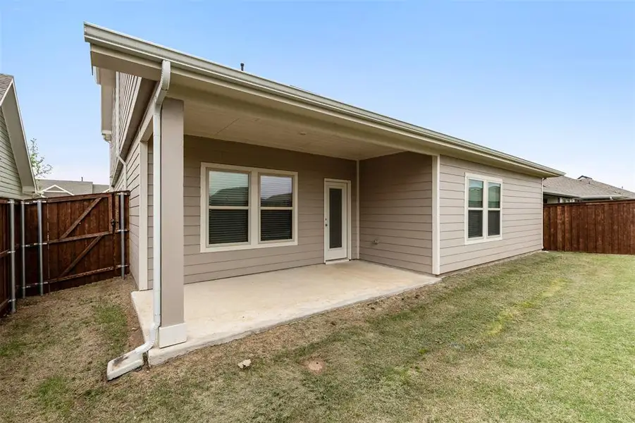 Exterior details and patio area of a home in , Providence Village (Image 3).