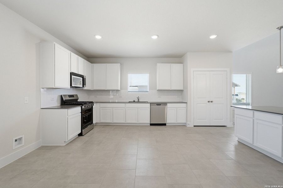 Furnished interior view inside a new home in Red Hawk Landing, San Antonio (Image 5).