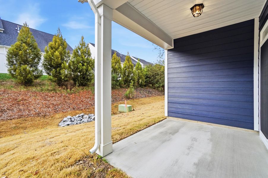 Exterior details and patio area of a home in Harrisburg Village Townhomes, Harrisburg (Image 31).