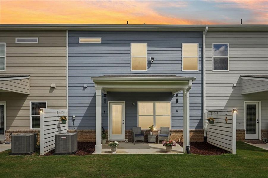 Exterior details and patio area of a home in Ellison Square, Sugar Hill (Image 21).