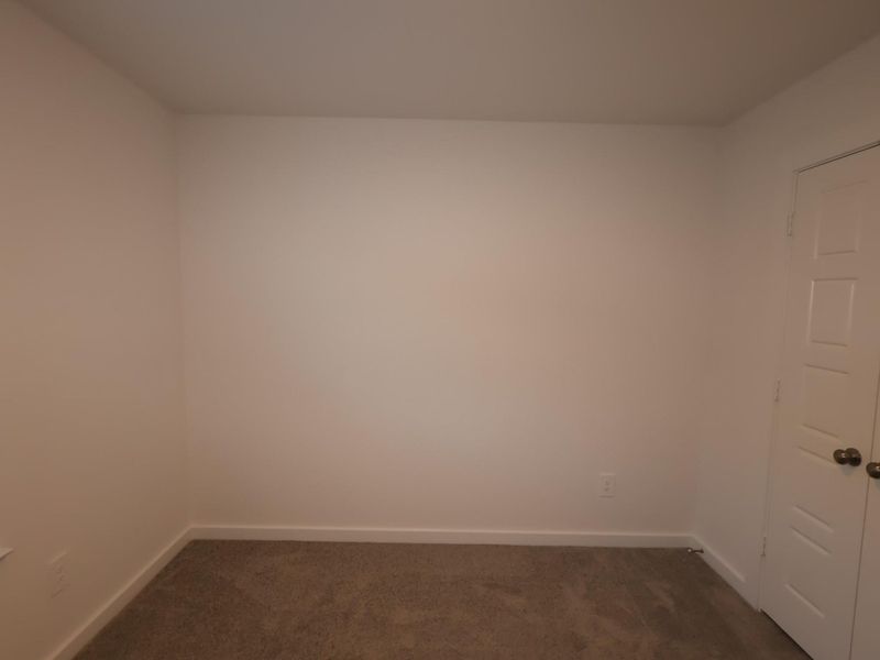 Spacious, unfurnished interior of a new home in Pinewood at Grand Texas, New Caney (Image 34).