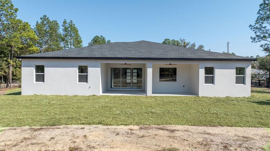 Exterior details and patio area of a home in , Ocala (Image 4).