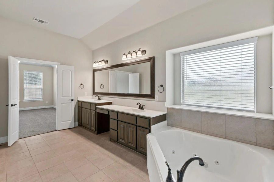 Primary Bathroom | Concept 2404 at Massey Meadows in Midlothian, TX by Landsea Homes