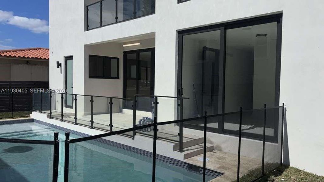 Exterior details and patio area of a home in , Miami (Image 5).