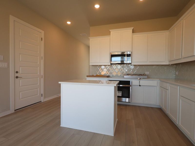 Furnished interior view inside a new home in Estancia West, Manchaca (Image 6).