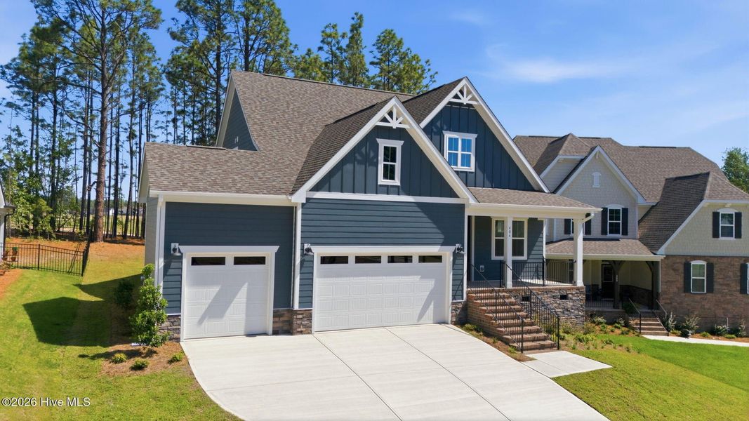 Front exterior of a new home in Legacy Lakes, Aberdeen, NC, highlighting curb appeal (Image 17).