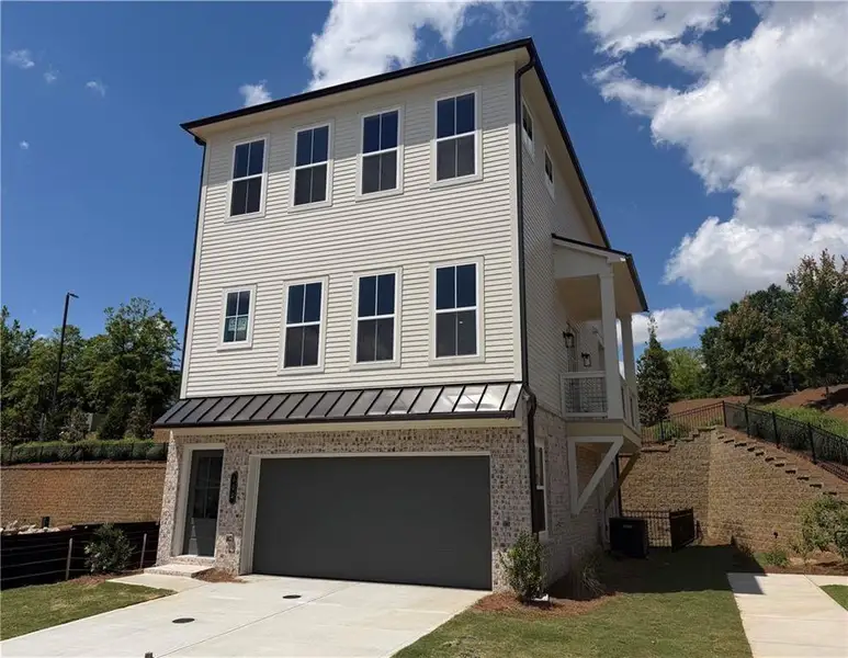 Front exterior of a new home in , Alpharetta, GA, highlighting curb appeal (Image 2). Front exterior of a new home in , Alpharetta, GA, highlighting curb appeal (Image 2).