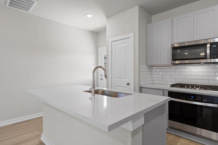 Furnished interior view inside a new home in Westridge Cove, Panorama Village (Image 6).