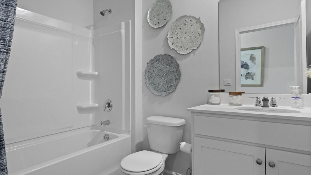 Furnished interior view inside a new home in Pine Hills at Cane Bay, Summerville (Image 38). Furnished interior view inside a new home in Pine Hills at Cane Bay, Summerville (Image 38).