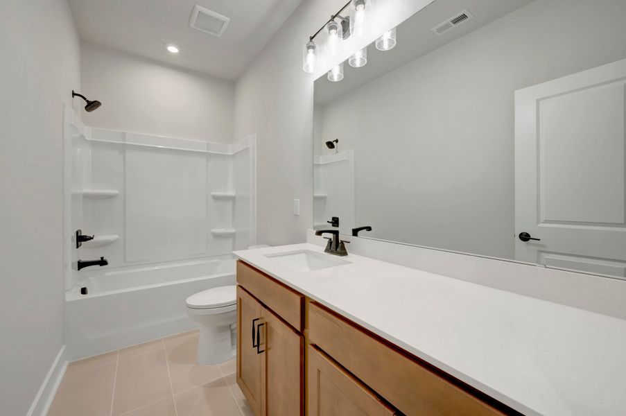 Furnished interior view inside a new home in Seven Oaks, Belmont (Image 9).