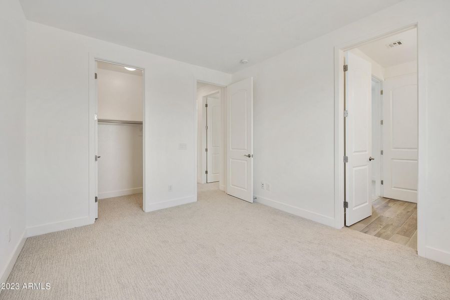 UPSTAIRS BEDROOM W WALK IN CLOSET