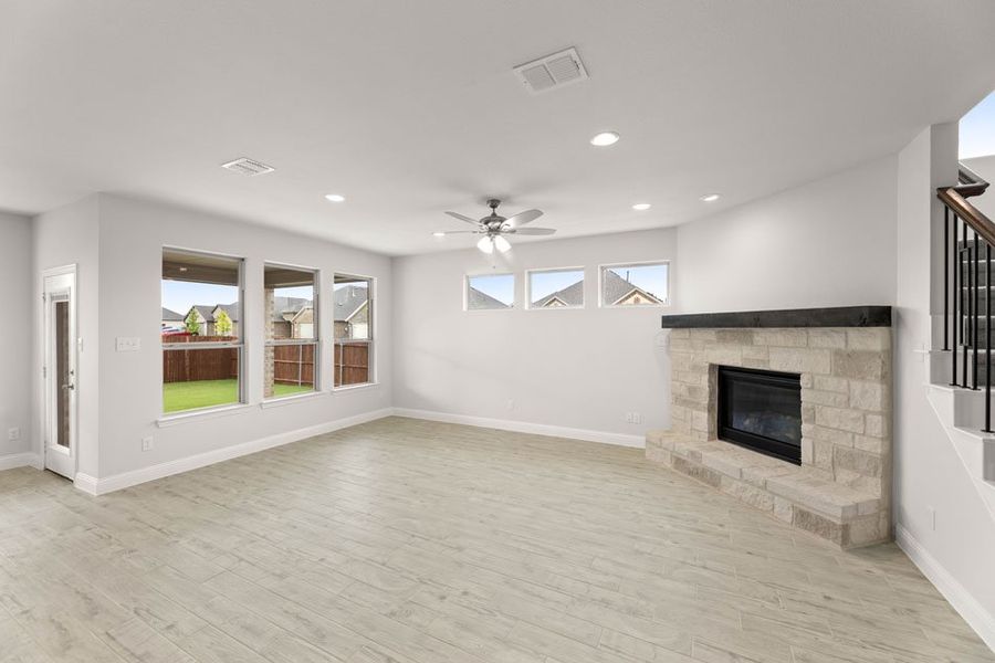 Representative exterior photo of a completed home built from the Winchester by Impression Homes in Timberbrook, Justin, TX (Image 10).