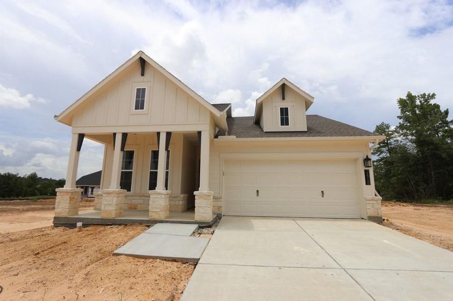 Front exterior of a new home in Colton 45' Homesites, Todd Mission, TX, highlighting curb appeal (Image 23). Front exterior of a new home in Colton 45' Homesites, Todd Mission, TX, highlighting curb appeal (Image 23).