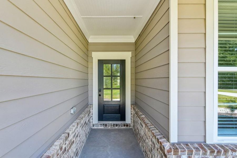 Exterior details and patio area of a home in Magnolia Ridge, Monroe (Image 26).