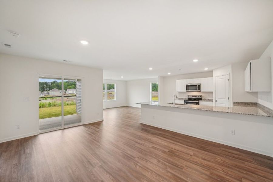 A kitchen with white cabinets. A kitchen with white cabinets.