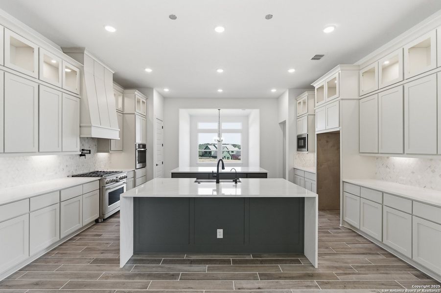 Furnished interior view inside a new home in Caliza Reserve, Boerne (Image 9).