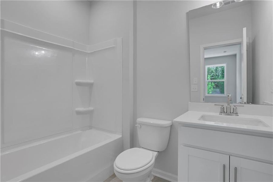 Furnished interior view inside a new home in Towne Village at Suwanee Dam, Sugar Hill (Image 6).