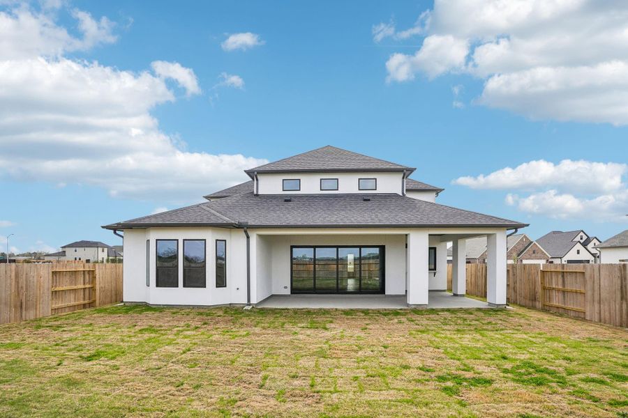 Exterior details and patio area of a home in Del Bello Lakes 60', Manvel (Image 28).