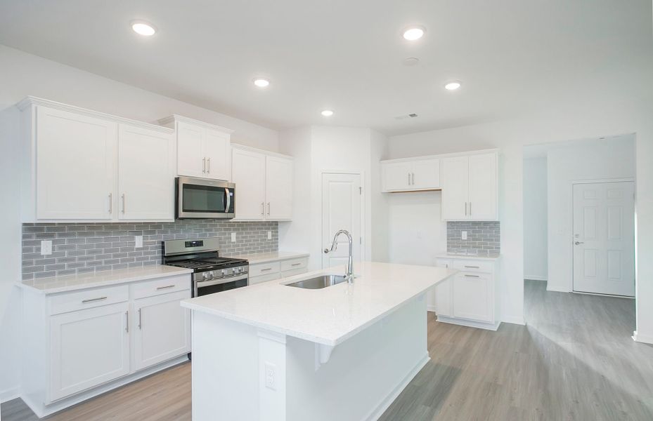 Homesite 96 Kitchen with Island in new home construction by Pulte Homes Nashville