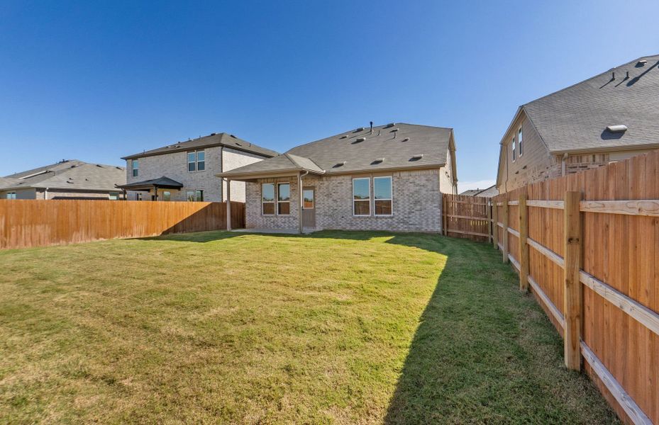 Exterior details and patio area of a home in Lagos, Manor (Image 21).