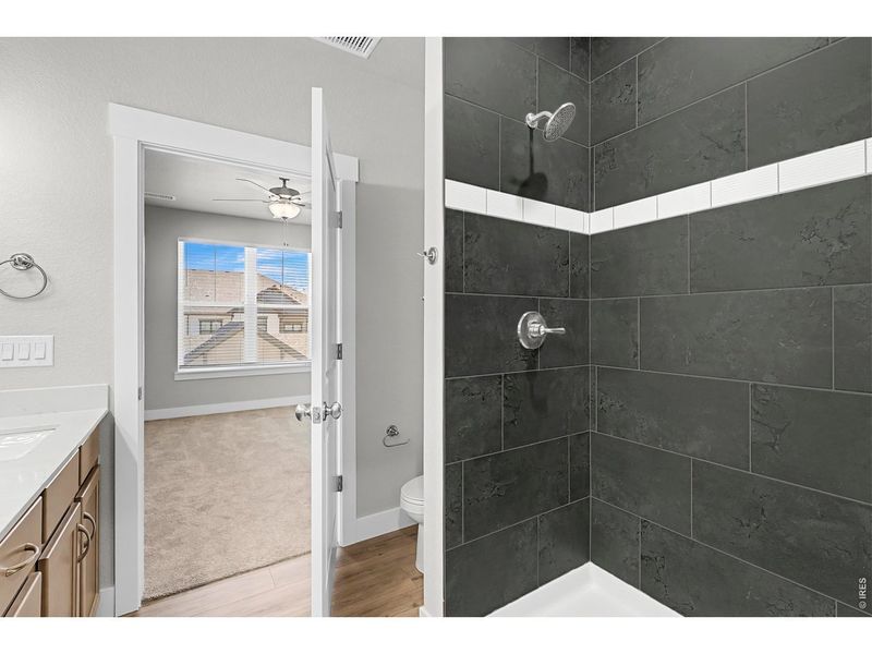 Furnished interior view inside a new home in Highlands at Fox Hill - The Flats, Longmont (Image 7).
