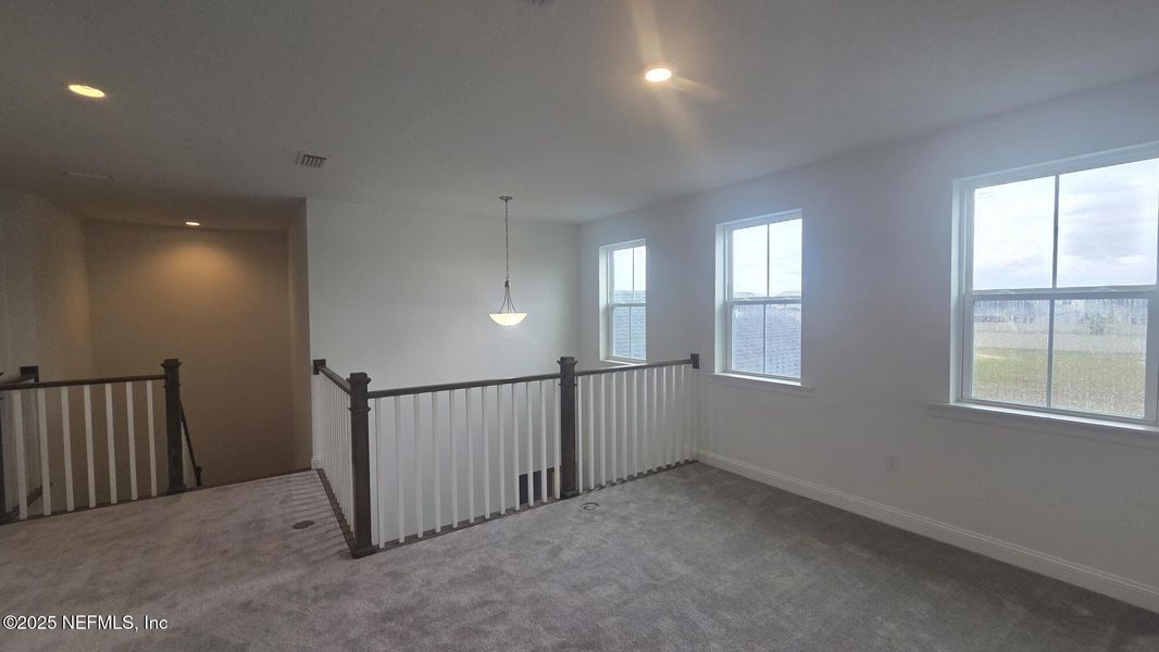 Spacious, unfurnished interior of a new home in , St. Johns (Image 25).