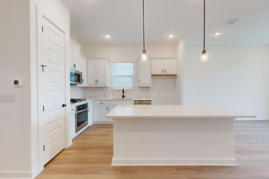 Furnished interior view inside a new home in Cedar Brook, Leander (Image 11). Furnished interior view inside a new home in Cedar Brook, Leander (Image 11).