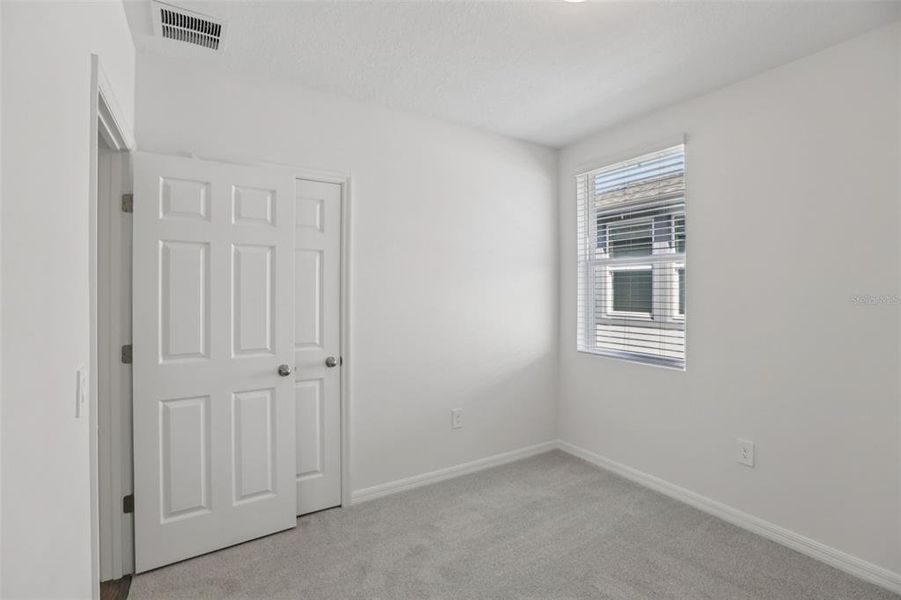 Spacious, unfurnished interior of a new home in Springs at Lake Alfred - Classic Series, Lake Alfred (Image 34).