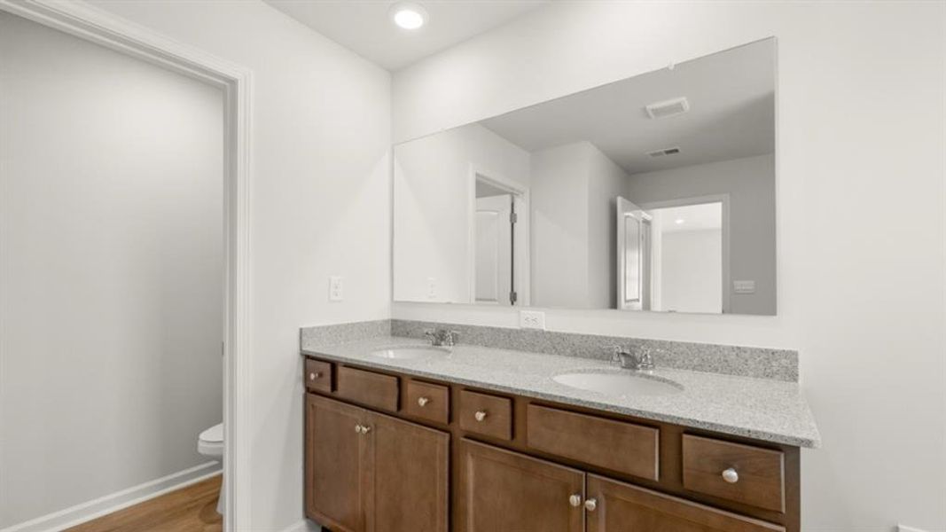 Furnished interior view inside a new home in Fairway 17 at Mirror Lake, Villa Rica (Image 11).