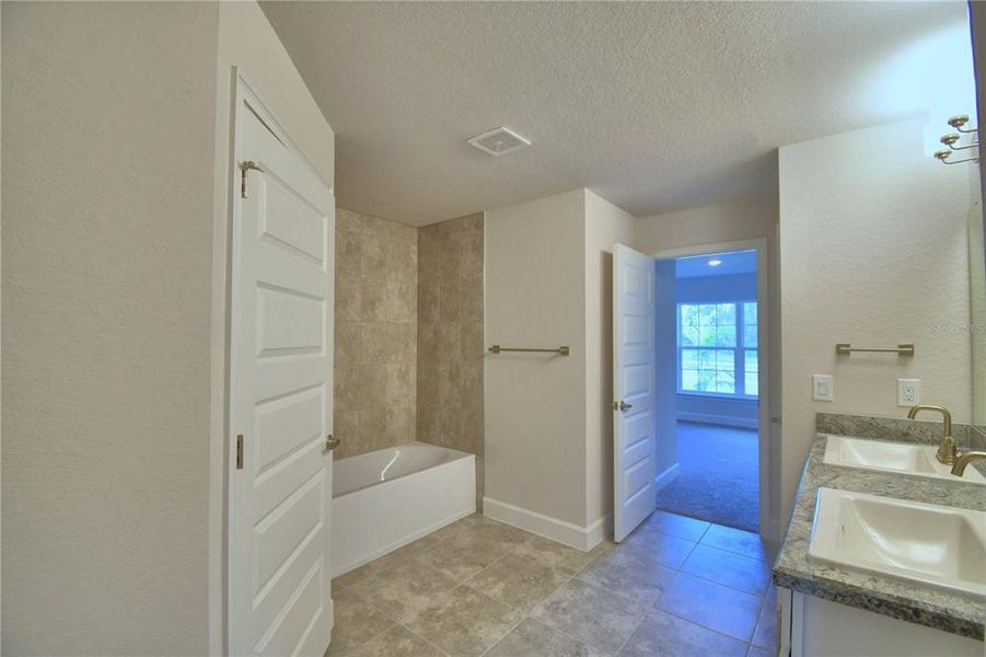 Furnished interior view inside a new home in Cadence Crossing, Auburndale (Image 18).