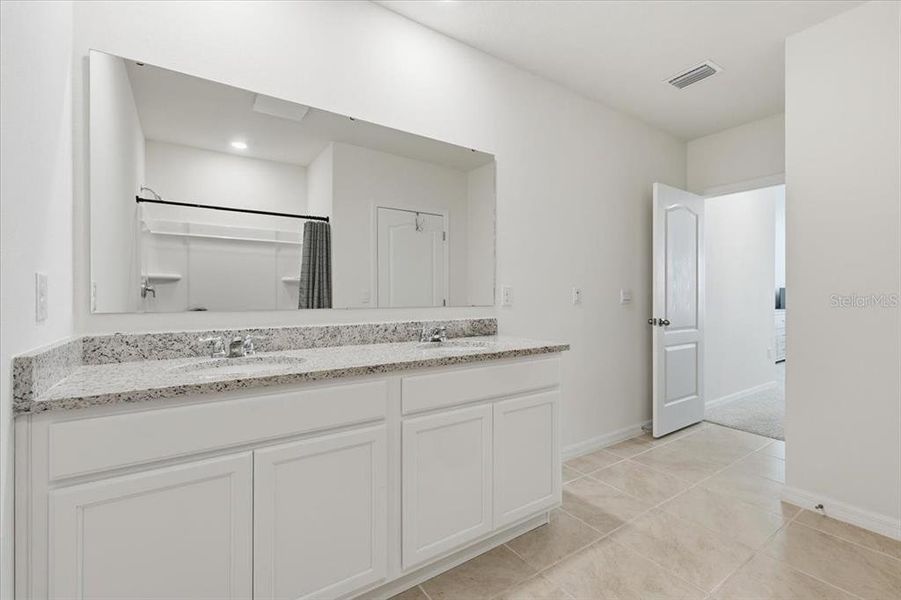Furnished interior view inside a new home in Oak Pointe, Apopka (Image 16). Furnished interior view inside a new home in Oak Pointe, Apopka (Image 16).