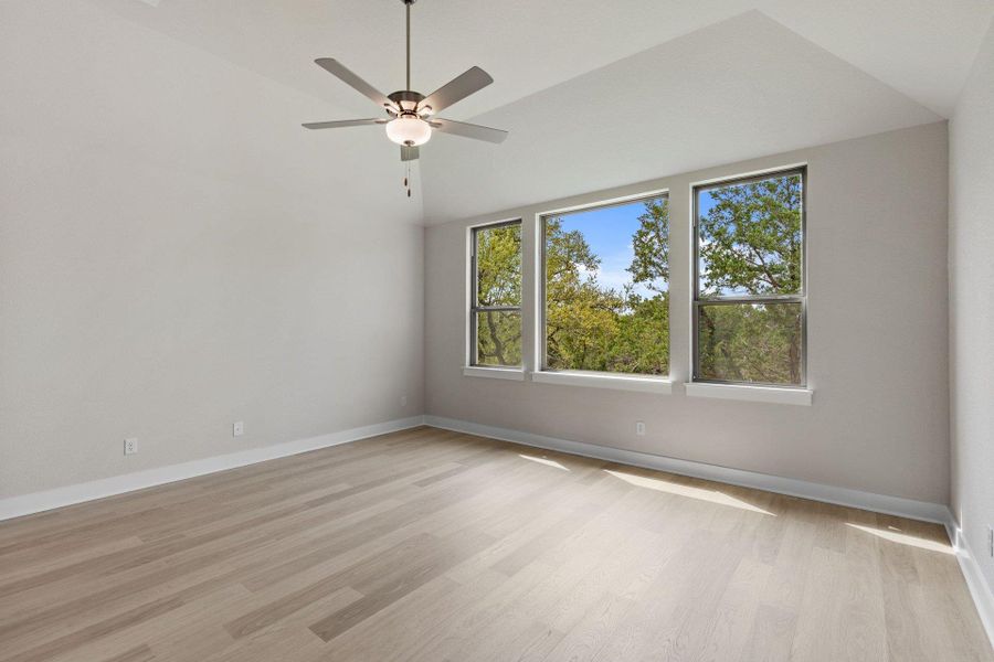 Primary Bedroom with elevated ceiling
