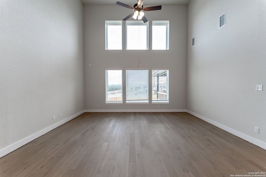 Spacious, unfurnished interior of a new home in The Woodlands at Medina Hills, Mico (Image 19).