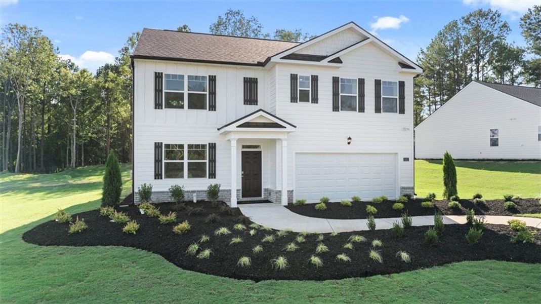 Front exterior of a new home in Jackson Landing, Jefferson, GA, highlighting curb appeal (Image 2). Front exterior of a new home in Jackson Landing, Jefferson, GA, highlighting curb appeal (Image 2).
