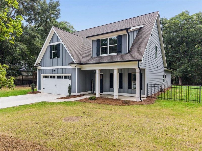 Front exterior of a new home in , Covington, GA, highlighting curb appeal (Image 24).