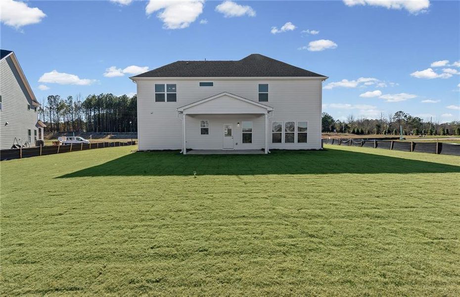 Exterior details and patio area of a home in Creekside at Skelton, Jefferson (Image 25).