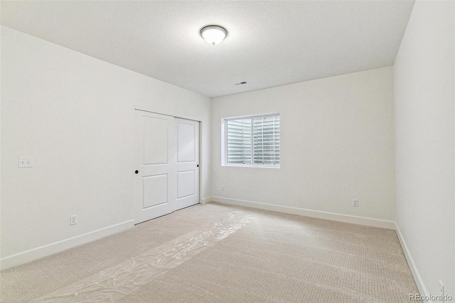 Spacious, unfurnished interior of a new home in Terrain Oak Valley, Castle Rock (Image 26).