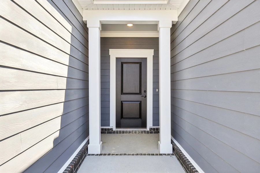 Exterior details and patio area of a home in Cedars of Cane Ridge | 55+ Community, Antioch (Image 2). Exterior details and patio area of a home in Cedars of Cane Ridge | 55+ Community, Antioch (Image 2).